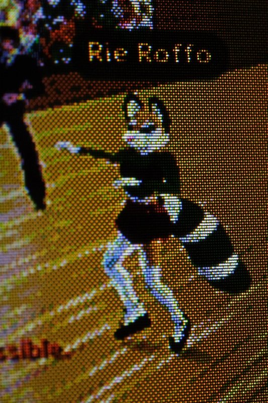 The RGB raccoon avatar on a screen during the opening