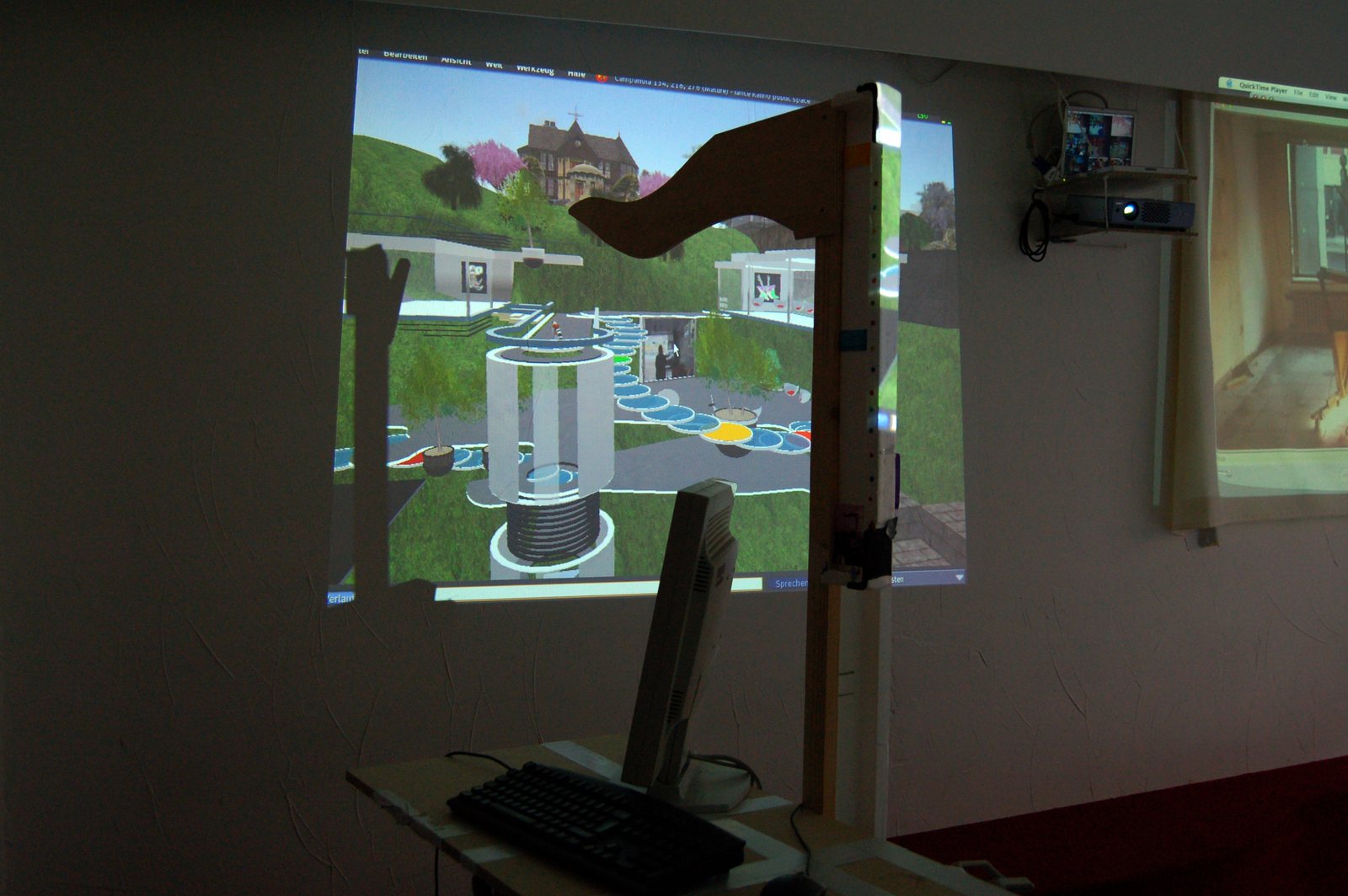 A Second Life space projected large onto the exhibition wall