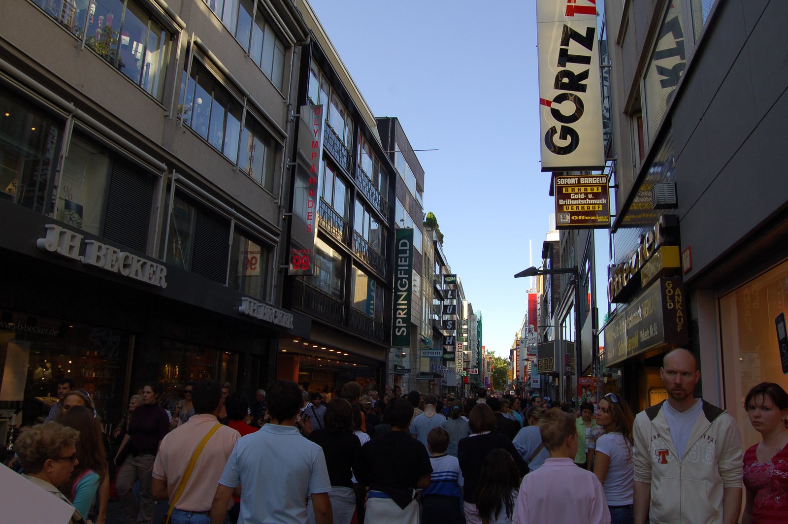 The blank sign carried down the busy street